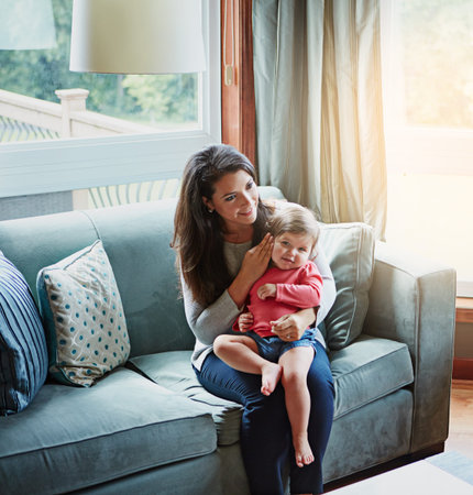 Relax, happy and smile with mother and baby on sofa for bonding, quality time and child development....