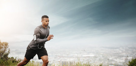 You achieve more when you dont give up. a sporty young man running outdoors.