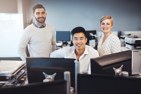 Were always productive. Cropped portrait of three creative colleagues working together in the...