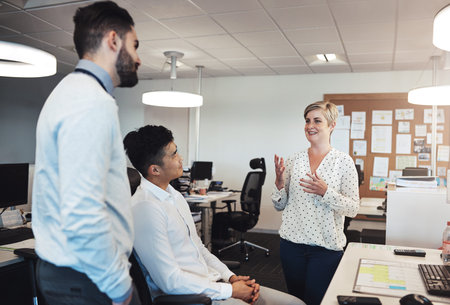 So heres what Im thinking...an attractive young female creative chatting to her colleagues while...