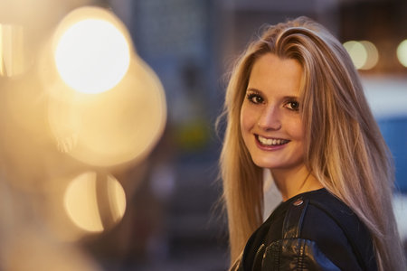 The city always feels like home. a confident young woman out and about in the city at night.