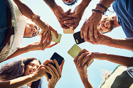 Whats happening in your social circle. a group of people using their cellphones in synchronicity...