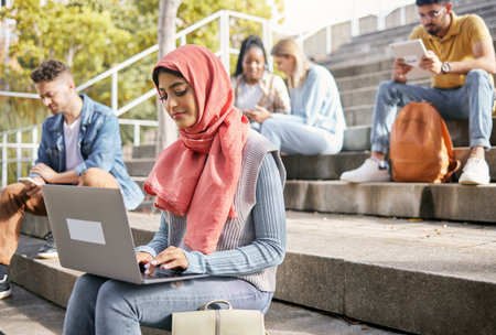 Students on stairs, Islamic woman and laptop for typing, connection and online reading outdoor....