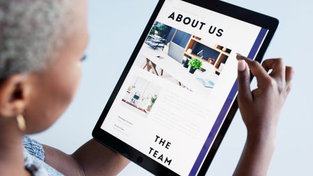 Marketing, advertising and tablet with a business woman or graphic designer working on a...