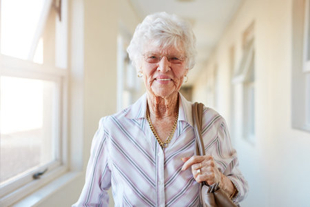 Ill be off now. Portrait of a happy elderly woman getting ready to go out.