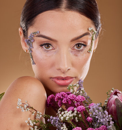 Floral beauty, flower bouquet and face of woman with eco friendly cosmetics, natural facial product or lavender skincare. Dermatology, spa salon and aesthetic model portrait with sustainable makeupの写真素材