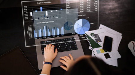 Woman, hands and laptop with hologram in analytics for chart, graph or marketing statistics at the...