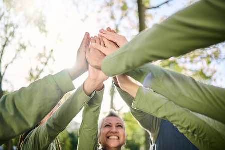 High five, outdoor and hands from team building at a wellness retreat with community and support....