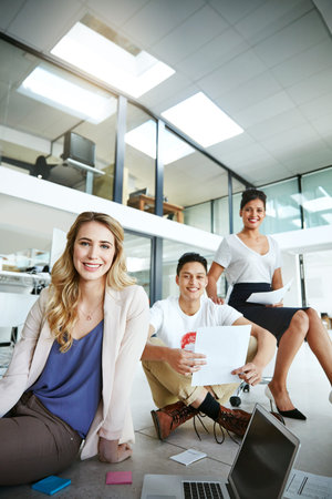 Weve got the best minds working on this campaign. Portrait of a group of colleagues having a...