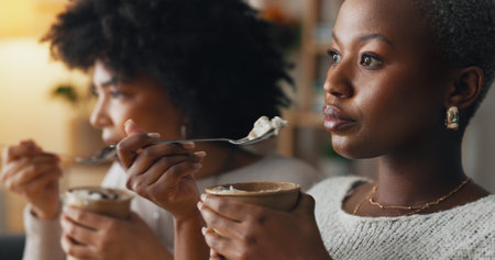 Relax, ice cream and women friends eating together on the weekend to bond with frozen dairy treats....