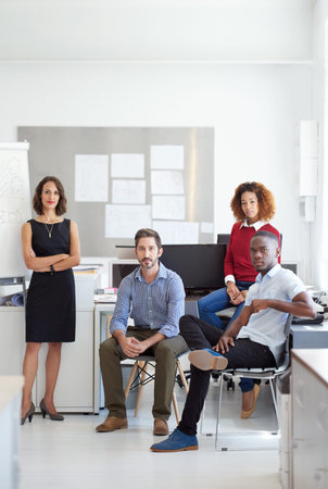 Lets get to work. Portrait of a diverse group of colleagues in an office.