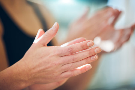 Clapping hands, applause and celebration of winning, success or team motivation well done. Happy, cheering and female clap hand for happiness, support or celebrating a win, good news or winner.の写真素材