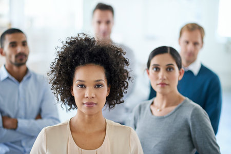 Workplace professionals. Portrait of a group of diverse colleagues standing in an office.
