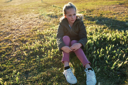 Relax, calm and girl thinking on the grass during summer for vacation, peace and zen in New Zealand....