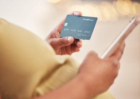 Pregnant, hands with phone and credit card for online shopping, fintech banking or payment. Pregnancy, digital retail and black woman with mobile smartphone for buying, paying or ecommerce online.の写真素材