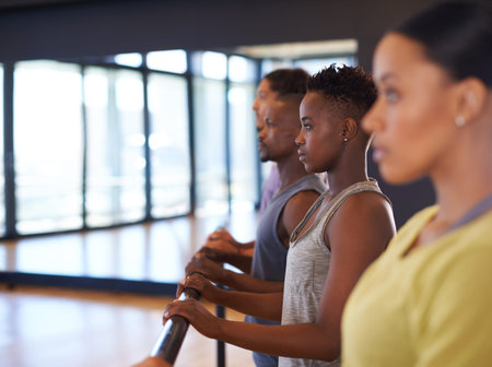 Friends and dance partners. a group of people practicing in a dance studio.