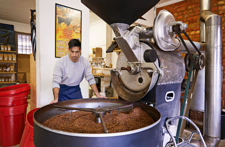 Roasting for maximum flavour. coffee production.