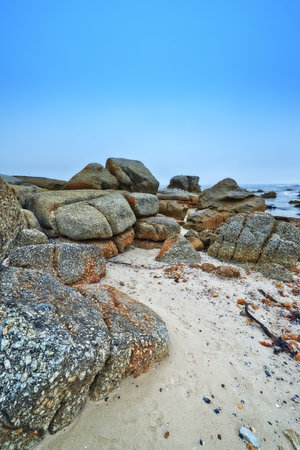 Rocky shores of the Western Cape. Rocky shoreline in the Western Cape, South Africa - close up.の写真素材