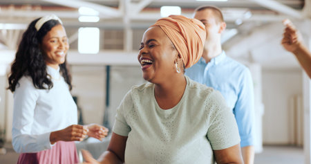 Diversity, team and black woman dance at office party event, celebrate startup mission success or...