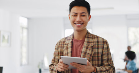 Email, social media and face of a businessman with a tablet for marketing website, web communication and networking. Digital marketing, smile and portrait of an employee with tech for planningの写真素材