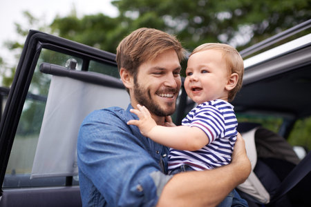 Having a son is every fathers dream. A handsome young father spending time with his baby.