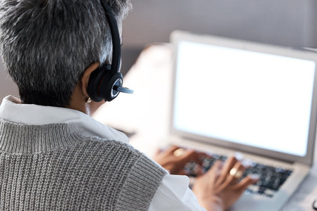 Call center, customer support and back of woman with laptop typing report, client review and...