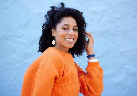Black woman, portrait or fashion hairstyle on isolated blue background, mockup backdrop or wall mock...