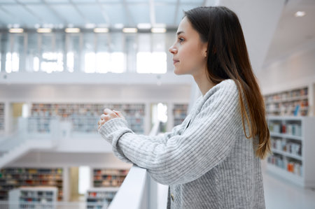 University, thinking and profile of woman in library for learning, reading and academic knowledge in...