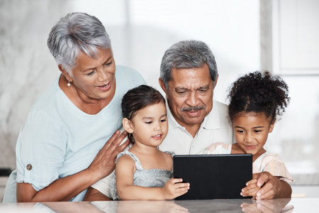 Learning, grandparents and kids with tablet in home, playing online games or educational app....