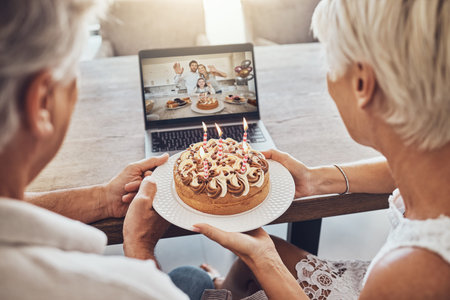 Birthday, cake and couple on video call on laptop for party, celebration or event in home. Big...