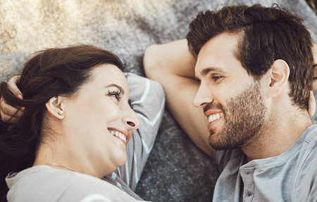 Love, couple romance and relax, talking and having fun time together outdoors on valentines day....