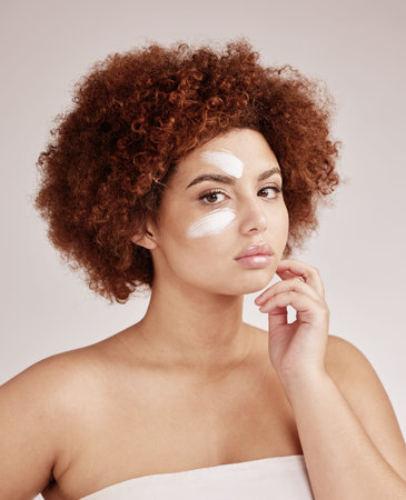 Facial cream, skincare and portrait of a woman with beauty, dermatology and face lotion. Sunscreen,...