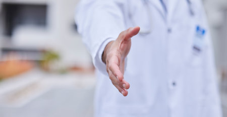 Doctor, handshake or hand for interview and welcome for hr, hiring and meeting in a medical hospital. Healthcare, medicine and nurse shaking hands for partnership, successful deal for onboarding teamの写真素材