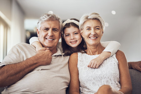 Relax, portrait or grandparents hug a girl in living room bonding as a happy family in Berlin with...