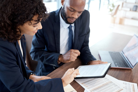 Corporate, black man and woman with tablet, documents and planning for new project, deadline and check paperwork together. Business, female employee and male manager with device, talking and formsの写真素材