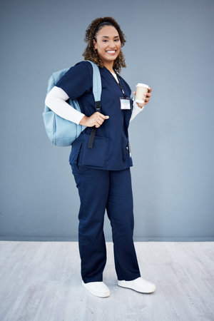 Woman, portrait or backpack for medical school, hospital internship goals or medicine university dream. Smile, happy or nurse with coffee on isolated mockup for education with learning bag for studyの写真素材