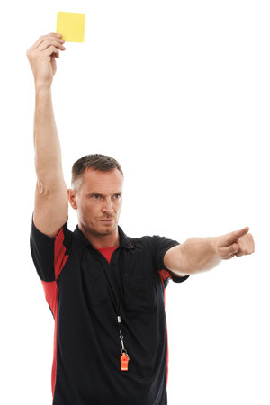 Sports referee, man and yellow card hand for warning soccer rules, penalty or fail in studio. Angry...