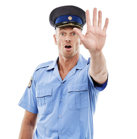Police, stop and officer or law enforcement with legal authority isolated against a studio white...