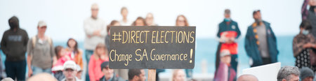 A fight for freedom. Cape Town, South African - October 2, 2021 Unrecognisable demonstrators holding...