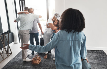 Big family, welcome hug and thank you gesture of grandparents, children and mom in a house. Living...