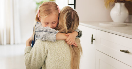 Hug, mother and child with love, care and smile to celebrate mothers day in their house. Young girl...