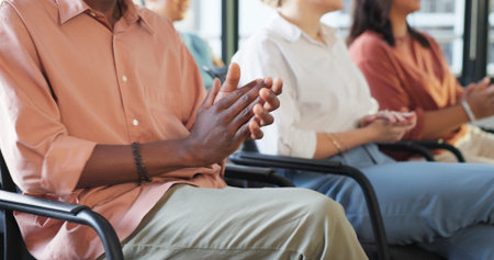 Hands, applause and crowd with a business team clapping during a meeting, presentation or seminar at...