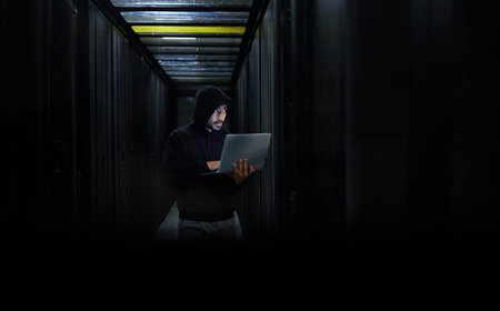 Man with laptop, hacker and dark web for cyber security, server and browse internet. Hacker, male...