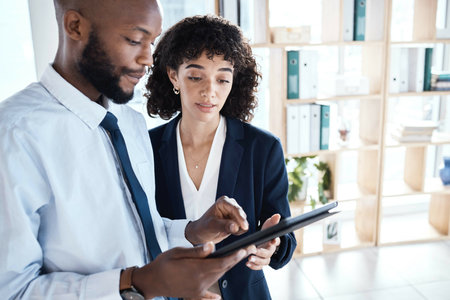 Black man, woman and tablet in office for teamwork, analysis and planning schedule at startup....