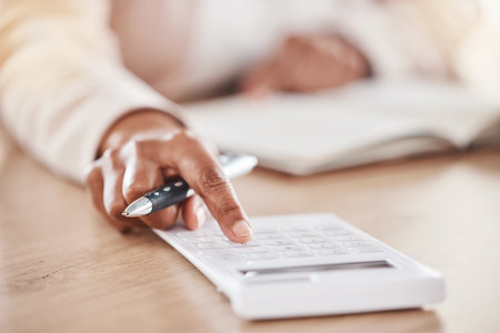 Hand, accountant or woman with calculator for financial strategy, tax or audit review for company growth in office. Finance, zoom or advisor for stock market, investment budget or mortgage planningの写真素材