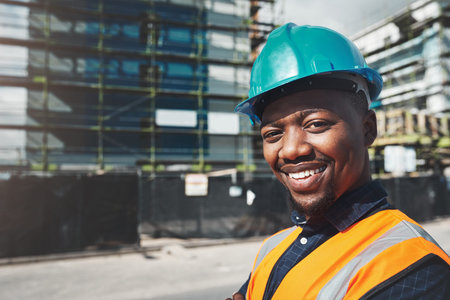 The proof is in the completed project. Portrait of a confident young man working at a construction...