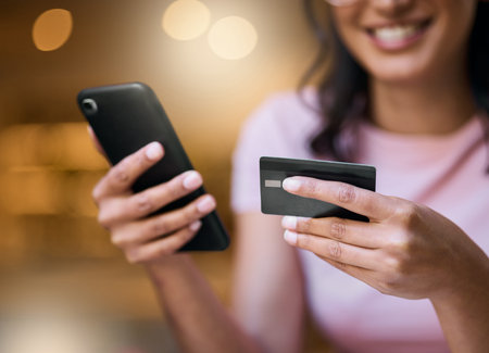 Online shopping, mockup and credit card by woman with mockup for advertising, ecommerce and bokeh...