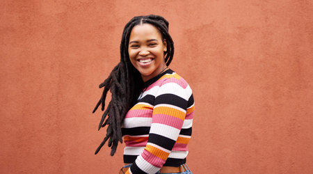 Portrait, wall and black woman with smile, fashion and freedom with joy, success and casual outfit....