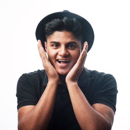 I dont believe it. Studio shot of a young man posing against a white background.