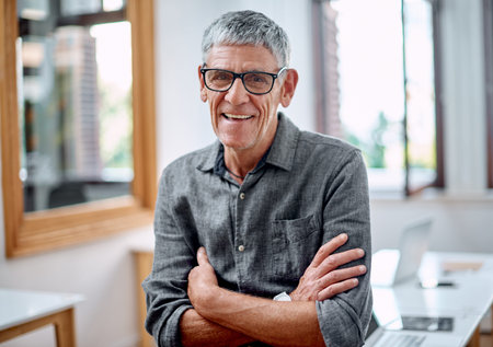 Its about having the will more so than the skill. Portrait of a senior businessman standing in an...